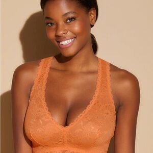 Cosabella Never Say Never Curvy Racerback Lace Bralette in peachy orange, small